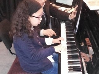 Cours prives de piano et de guitare a domicile .